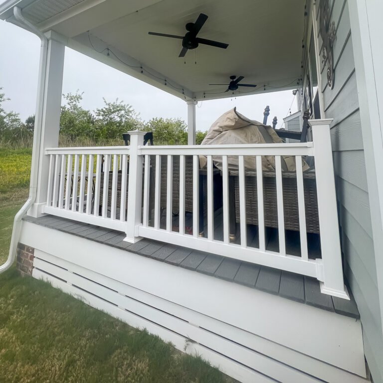 Back Porch Builder project featuring a completed back porch and composite deck in Chesapeake
