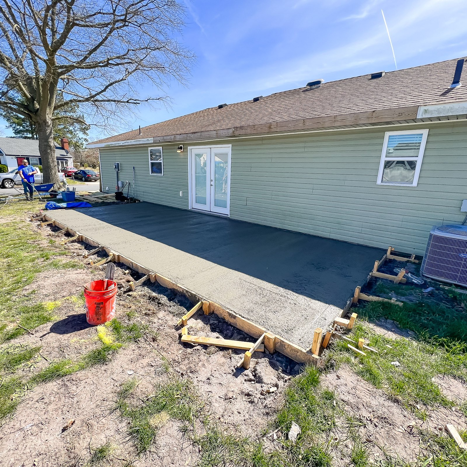 Finished concrete patio with a clean surface by an Outdoor Living Contractor in Chesapeake