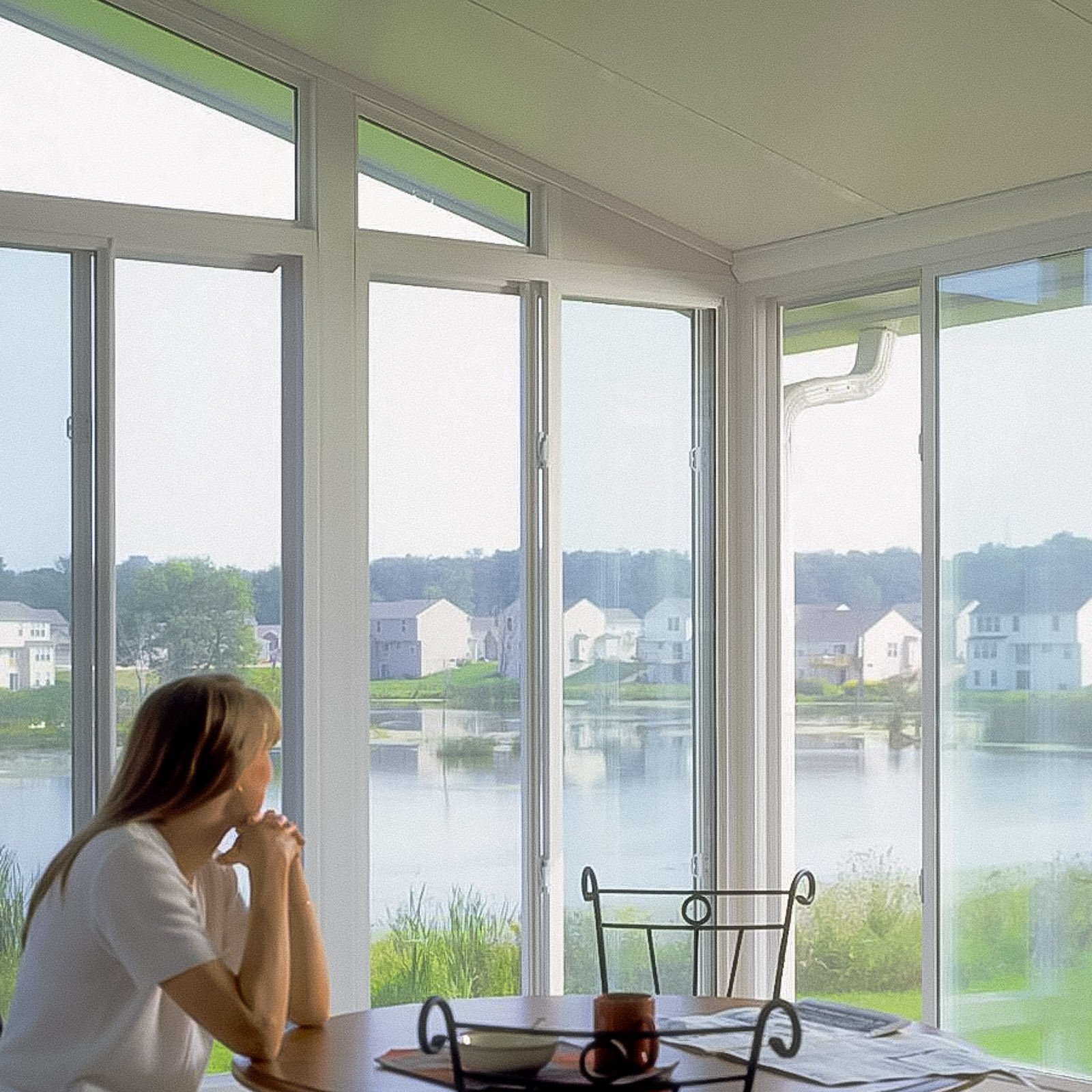 Sunroom Addition Builder project featuring a glass gable sunroom addition attached to a Hampton Roads home