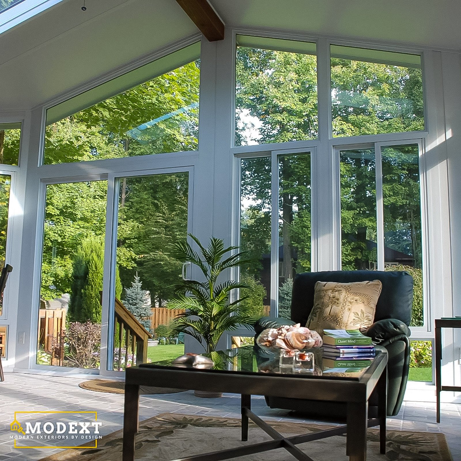 Gable sunroom with large glass walls by an Outdoor Living Contractor in James City County