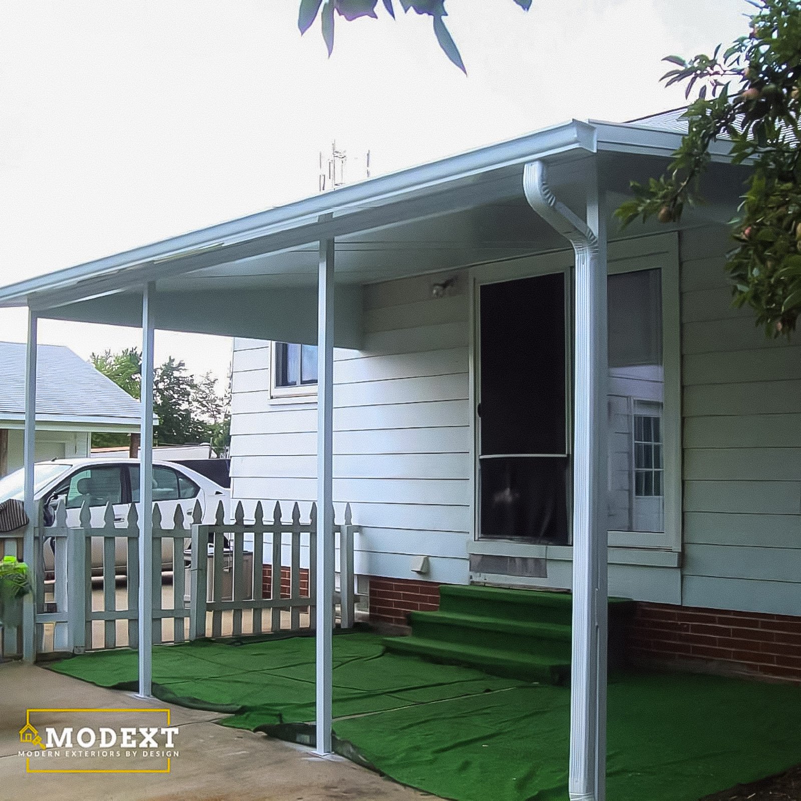 Covered Patio Builder project featuring an attached covered patio creating shade behind a Hampton Roads home