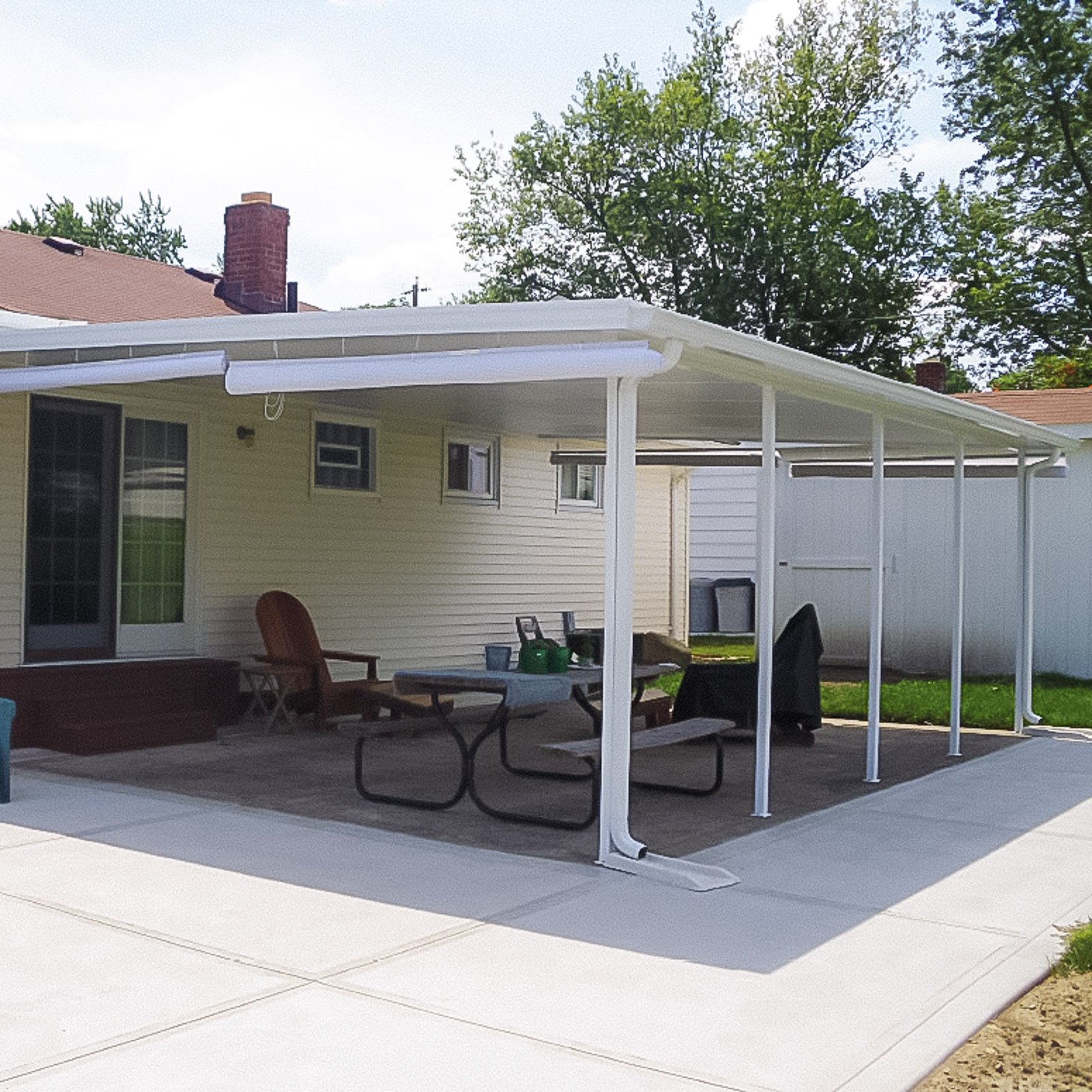 Awning Contractor project featuring an attached shade cover extending from the home