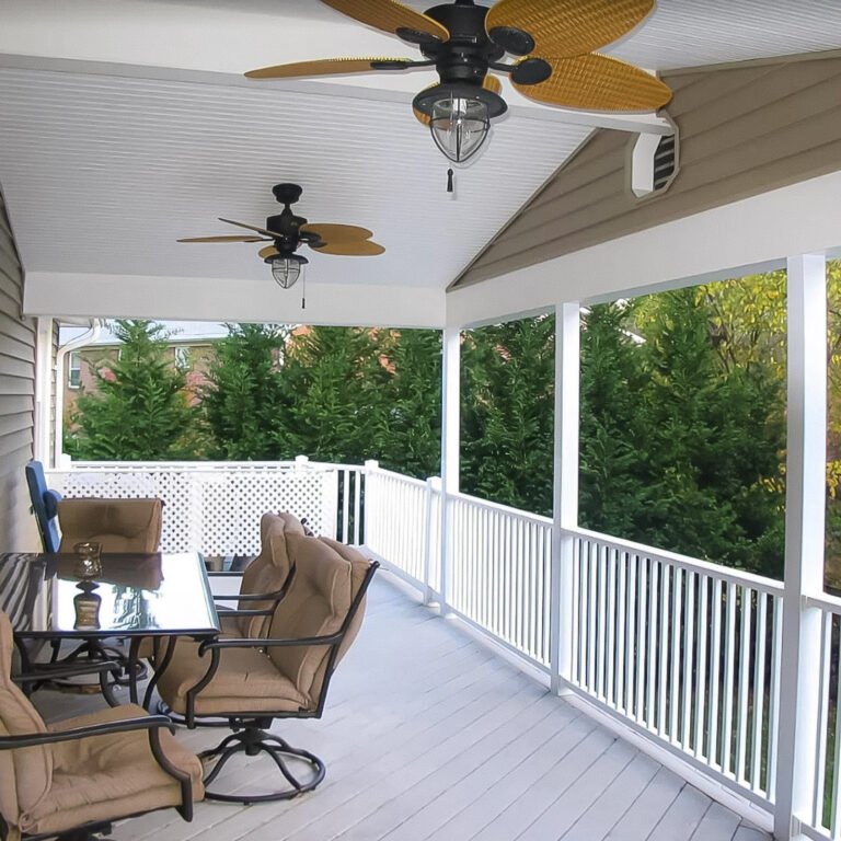 Screened porch enclosure with white square balusters and kneewalls