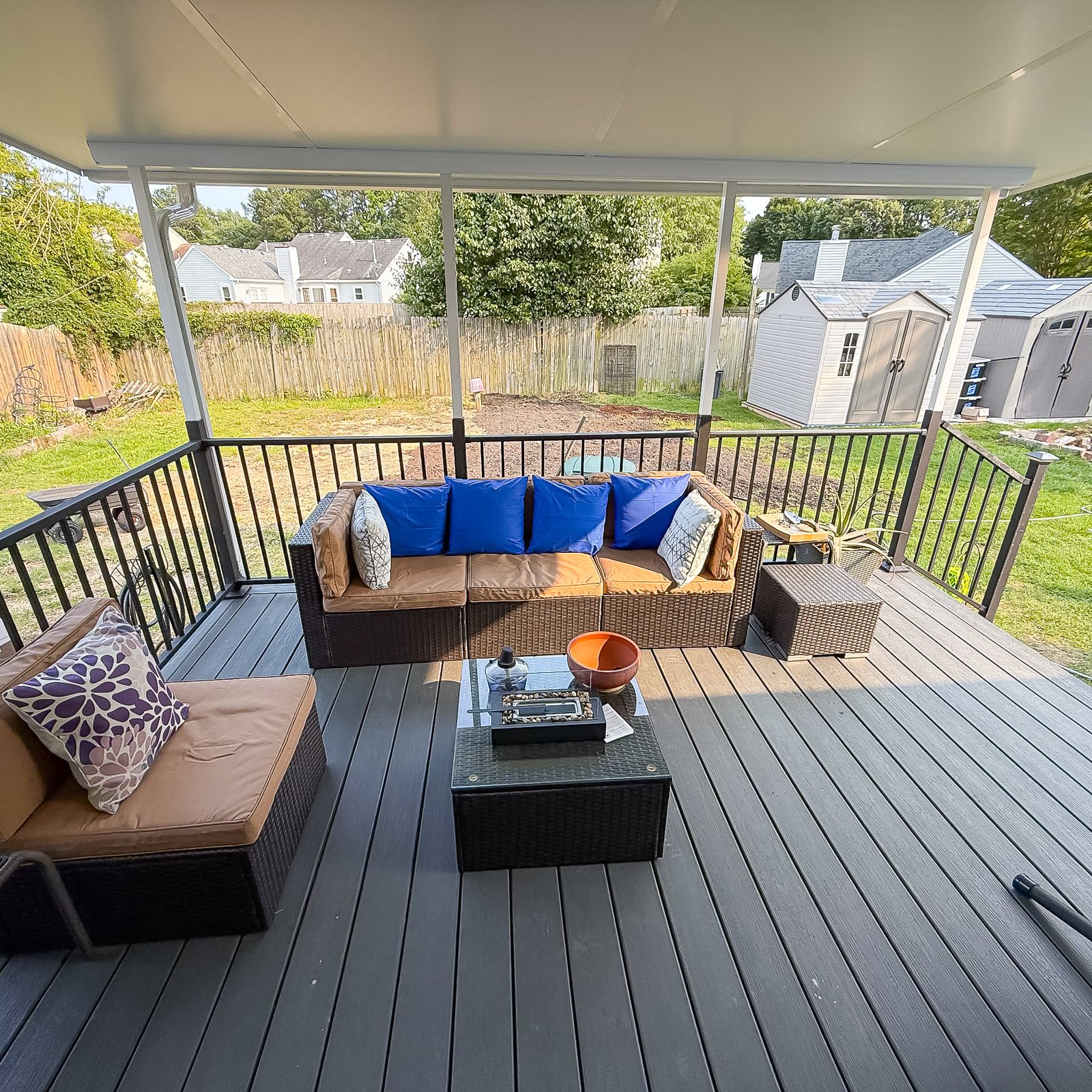 Covered deck addition with roof protection by an Outdoor Living Contractor in Suffolk