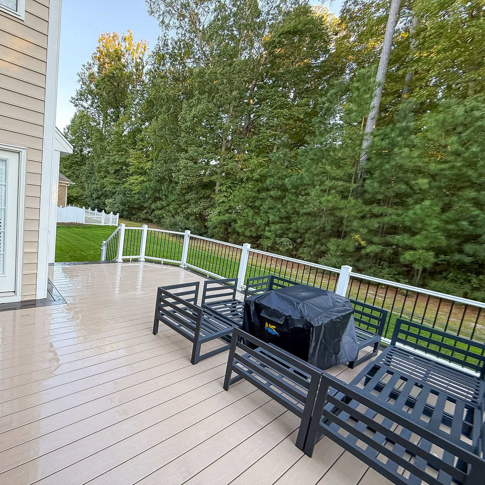 Yorktown composite deck with a low-maintenance finish by an Outdoor Living Contractor in York County