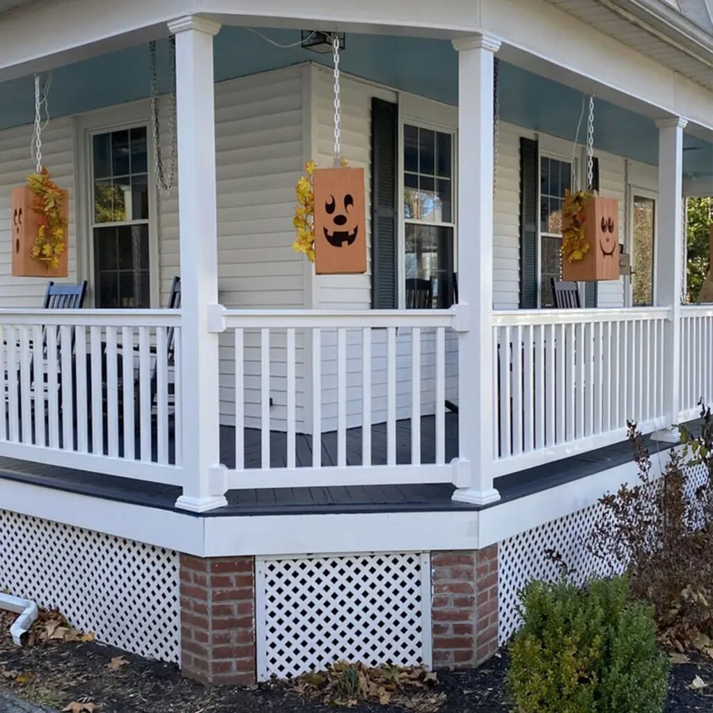 Porch Addition Contractor project featuring a wraparound porch and deck addition extending along the home